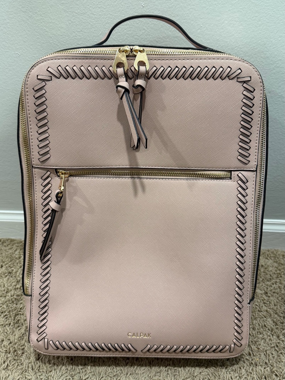 Calpak Blush Pink Travel Backpack with  Gold Trim and Logo